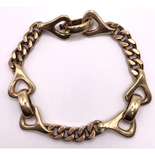 568 - A 9ct gold fancy link bracelet, 29.3 g