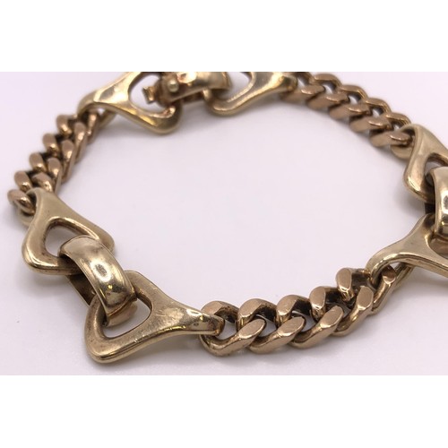 568 - A 9ct gold fancy link bracelet, 29.3 g