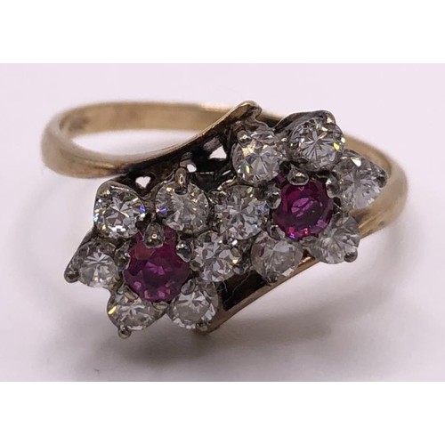 578 - A yellow metal and pink stone ring, ring size L, a crossover ring, a pair of studs, and a 9ct gold r... 