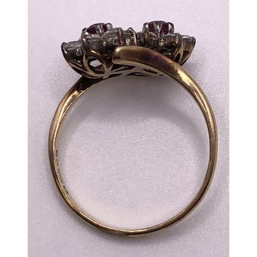 578 - A yellow metal and pink stone ring, ring size L, a crossover ring, a pair of studs, and a 9ct gold r... 