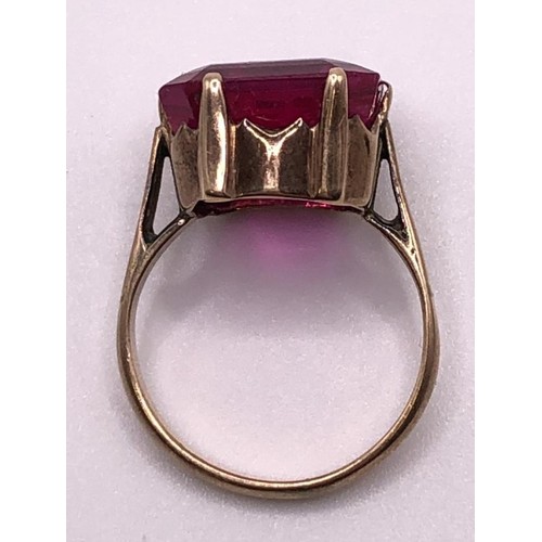 578 - A yellow metal and pink stone ring, ring size L, a crossover ring, a pair of studs, and a 9ct gold r... 