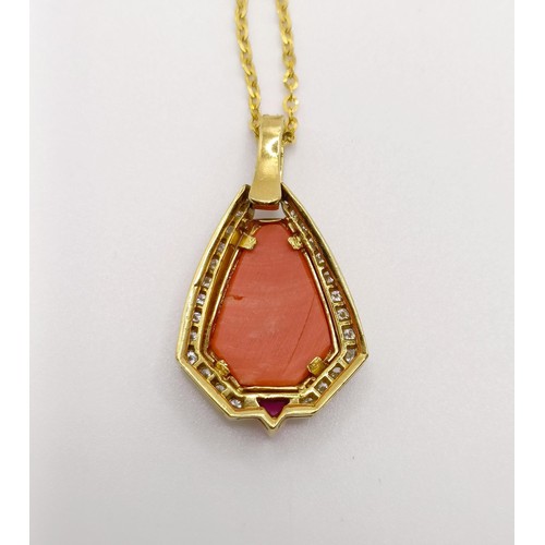 580 - An 18ct gold, coral and diamond pendant, on an 18ct gold chain