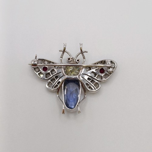 588 - A diamond, aquamarine and ruby bee brooch, the central diamond 1.2ct approx.