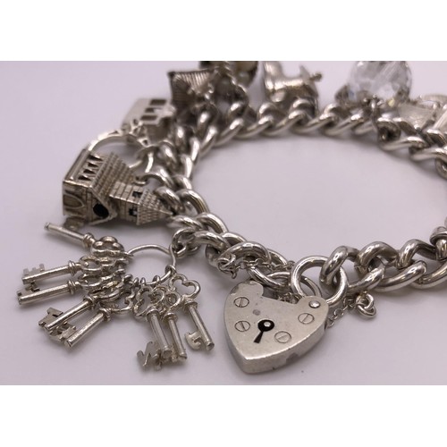 591 - A silver charm bracelet