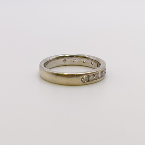 594 - An 18ct gold and diamond full eternity ring, ring size L