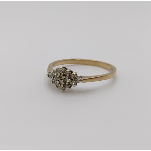 598 - An 18ct gold and diamond cluster ring, ring size N