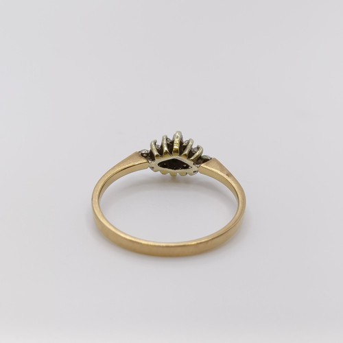 598 - An 18ct gold and diamond cluster ring, ring size N