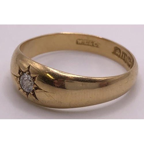 599 - An 18ct gold and diamond gypsy set ring, ring size S, in a vintage jewellery box