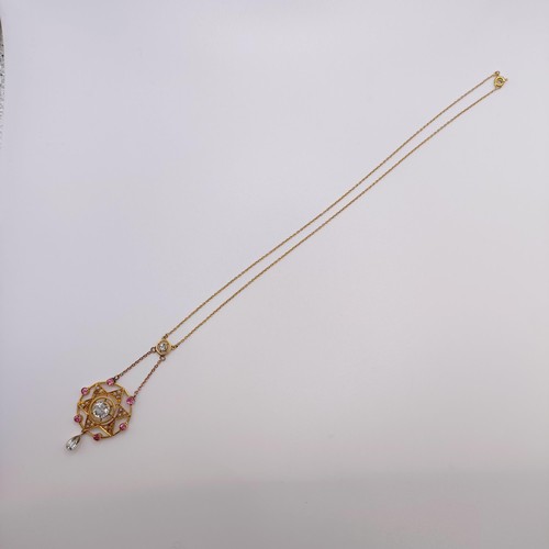 605 - A 15ct gold, aquamarine, pink stone and seed pearl pendant, on a chain