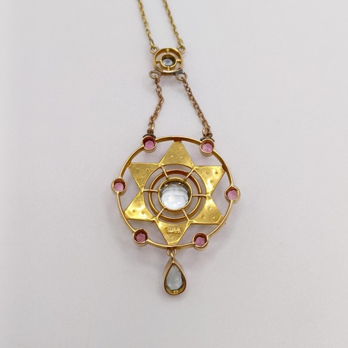 605 - A 15ct gold, aquamarine, pink stone and seed pearl pendant, on a chain