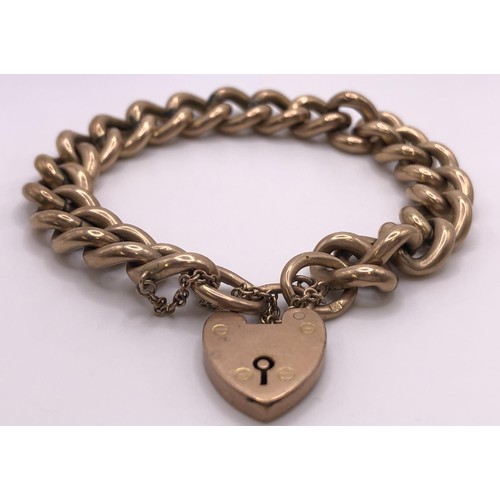 609 - A 9ct gold bracelet, with a heart shaped padlock clasp, 22.6 g