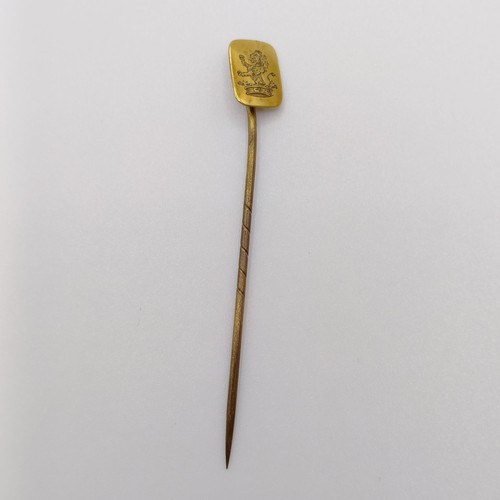 612 - A 9ct gold and diamond stick pin, a bar brooch, and two stick pins (4)