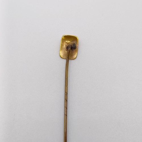 612 - A 9ct gold and diamond stick pin, a bar brooch, and two stick pins (4)