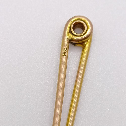 612 - A 9ct gold and diamond stick pin, a bar brooch, and two stick pins (4)