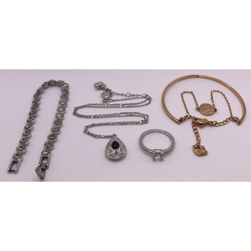 613 - A dress ring, a gold plated bangle, and costume jewellery (4)