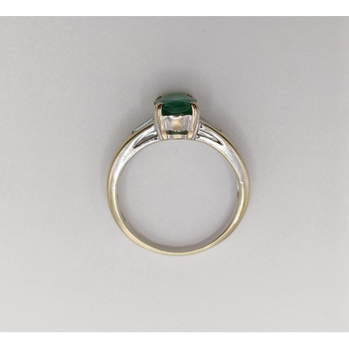 617 - An 18ct gold, emerald and diamond ring, ring size L