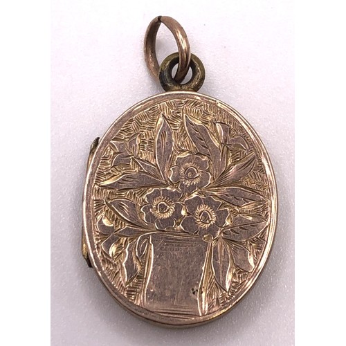 618 - A 9ct gold cross pendant, carved portrait, a yellow metal locket, and a late Victorian 9ct gold memo... 