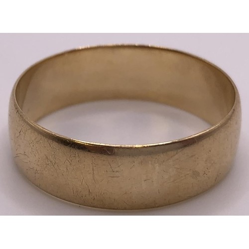 620 - A 9ct gold wedding band, ring size X, 5.3 g