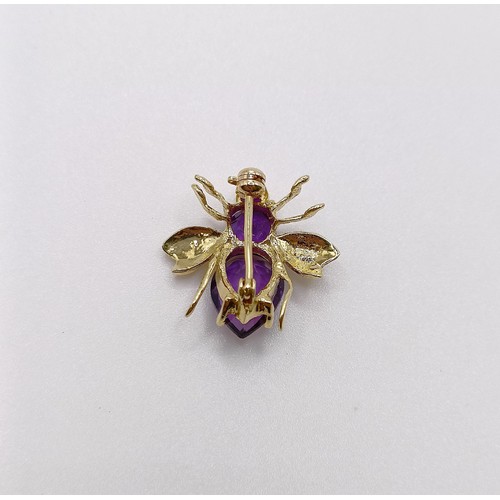 623 - A 14ct gold and amethyst bee brooch