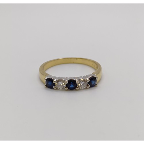 629 - An 18ct gold, diamond and sapphire five stone ring, ring size Q