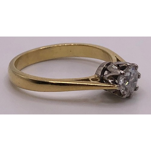 630 - An 18ct gold and diamond solitaire ring, ring size M