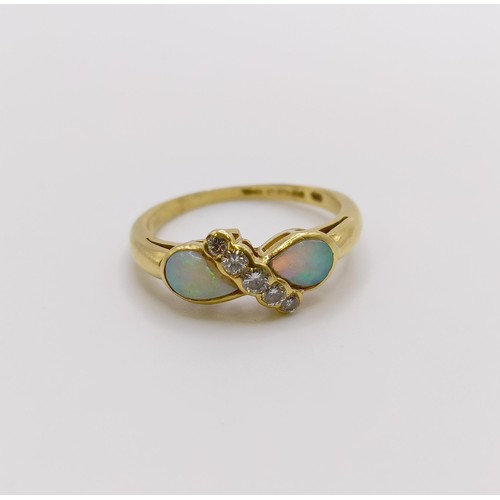 631 - An 18ct gold, diamond and opal ring, ring size K