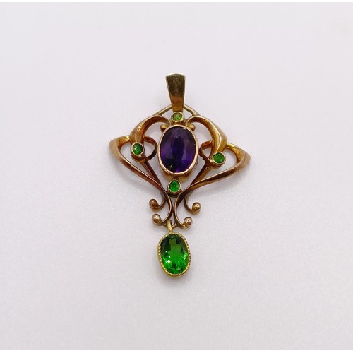 633 - An Art Nouveau 9ct gold and multi-coloured stone pendant