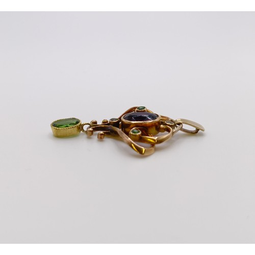 633 - An Art Nouveau 9ct gold and multi-coloured stone pendant