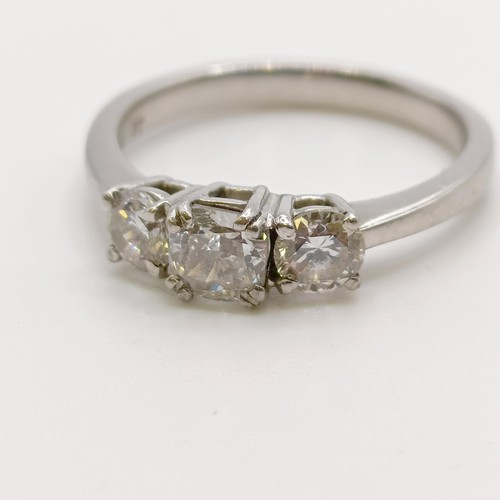 637 - A lab grown diamond three stone ring, central stone 0.5ct