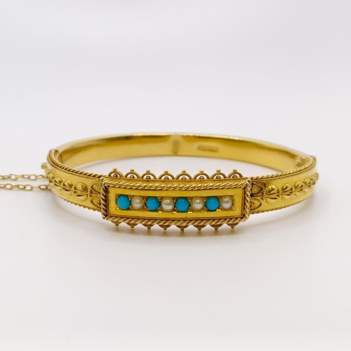 647 - A late 19th/early 20th century 15ct gold, turquoise and seed pearl bangle, 15.8 g all in