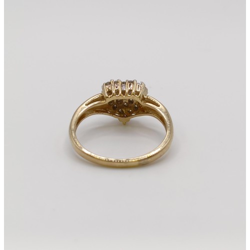 651 - A 9ct gold and diamond cluster ring, ring size M