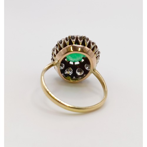 658 - An 18ct gold, diamond and Chinese greenstone ring, ring size M