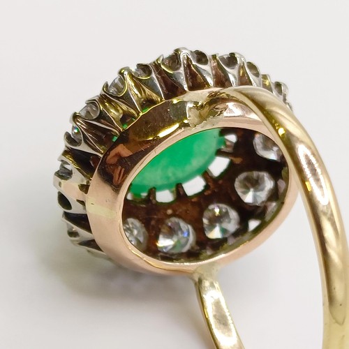 658 - An 18ct gold, diamond and Chinese greenstone ring, ring size M