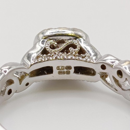 659 - A 14ct gold and diamond ring, by Nick Lane, ring size M