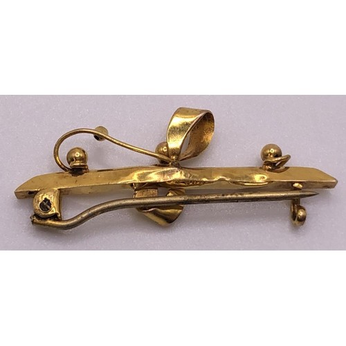 662 - An late 19th/early 20th century, 9ct gold and seed pearl bar brooch, three other bar brooches, and a... 