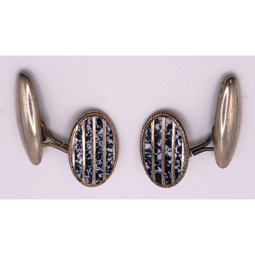 663 - A pair of gold plated and enamel oval cufflinks