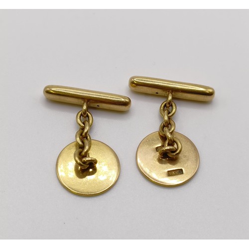 664 - A pair of 18ct gold and blue enamel cufflinks, monogrammed WS, all in 10.9 g