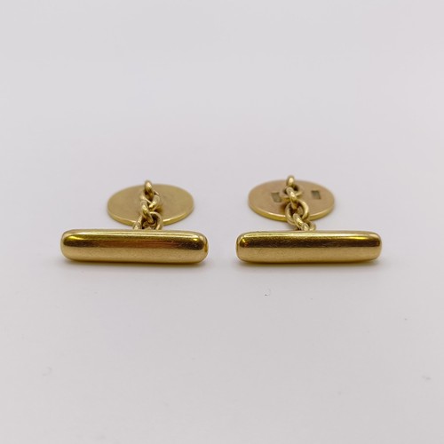 664 - A pair of 18ct gold and blue enamel cufflinks, monogrammed WS, all in 10.9 g