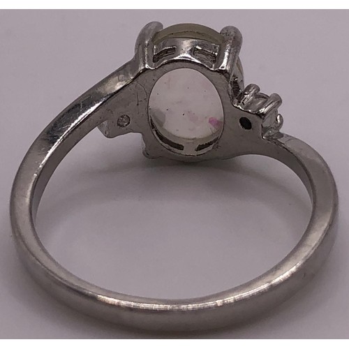 665 - A Sarah Cov dress ring, a silver and opal dress ring, and a bracelet (3)