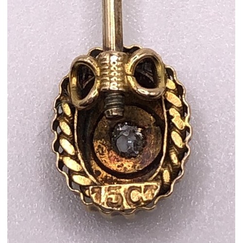 666 - An early 20th century 15ct gold and diamond stick pin, cased