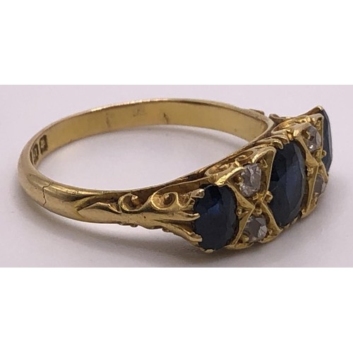 670 - An 18ct gold, sapphire and diamond ring, ring size S