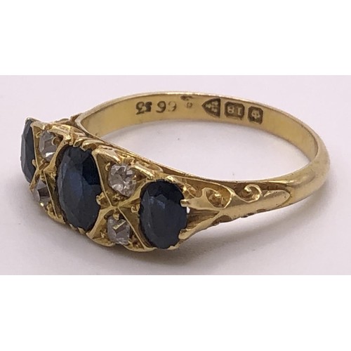 670 - An 18ct gold, sapphire and diamond ring, ring size S