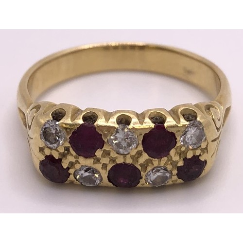 678 - A yellow coloured metal, garnet and diamond ring, ring size N