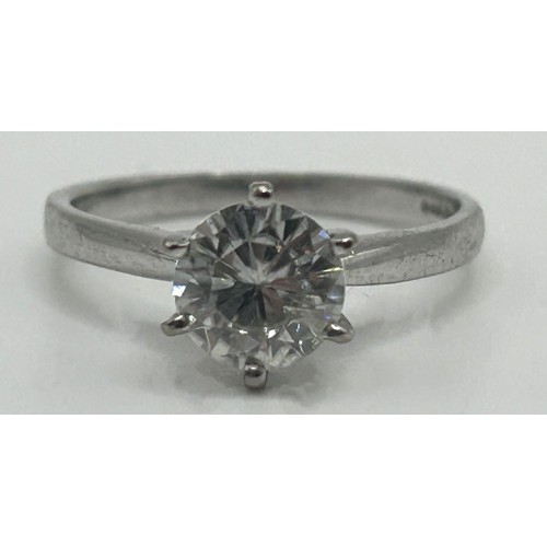 683 - An 18ct gold and white stone solitaire ring, ring size K