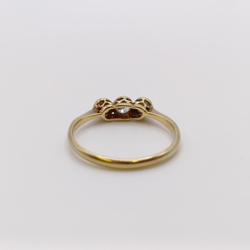 684 - An 18ct gold and diamond three stone ring, ring size L