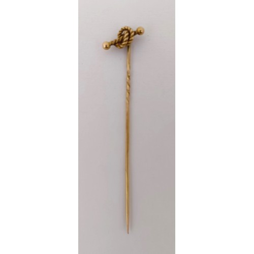 712 - A 9ct gold stick pin, in a vintage jewellery box, and assorted costume jewellery