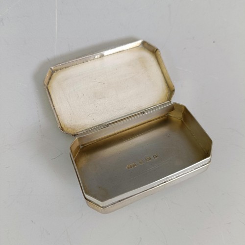 61 - A silver pill box, with engine turned decoration, Birmingham 1911, a silver cigarette case, inscribe... 