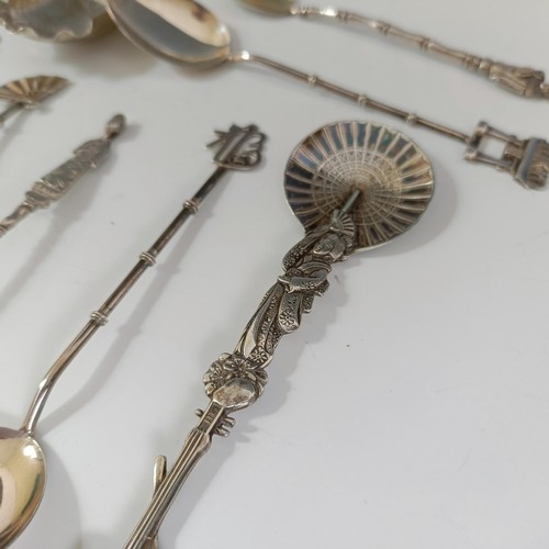 73 - Assorted Japanese and Chinese silver coloured metal spoons