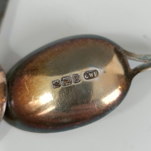 75 - Assorted silver coloured metal and other travel/commemorative spoons, some with enamel decoration