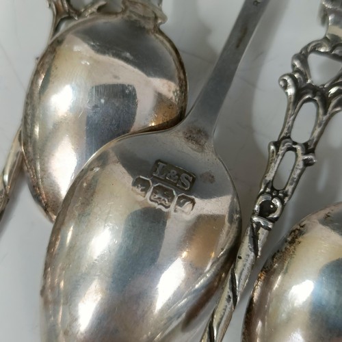 75 - Assorted silver coloured metal and other travel/commemorative spoons, some with enamel decoration